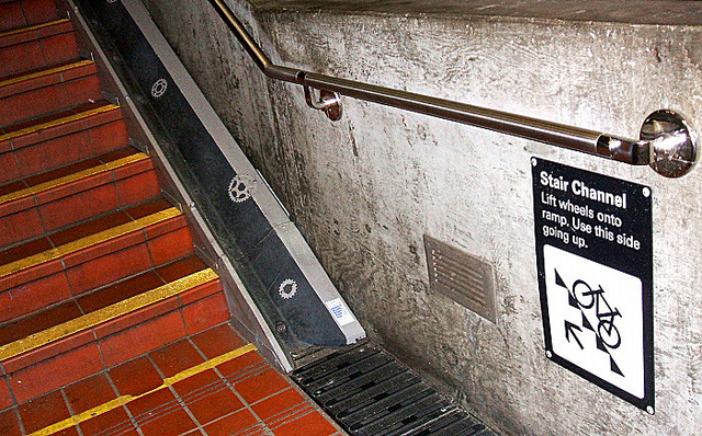 BART 16th Street San Francisco station stair channel for bikes. Photo via Jym Dyer Flickr