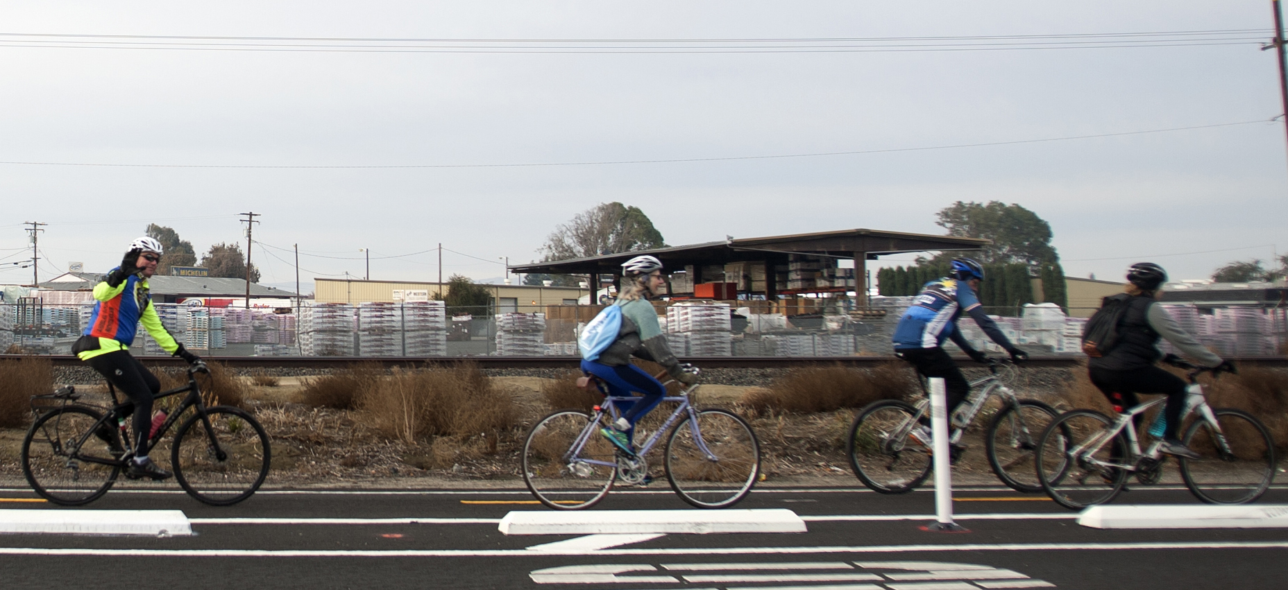 Stanislaus County Bicycle Club members ride down the curb-protected, two-way bike lane that connects the two campuses of Modesto Junior College. Photo: Minerva Perez