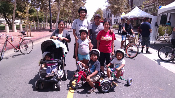 Jesus Rodriguez, 35, and his family at Santa Ana's 5k/Ciclovia. Rodriguez said he learned about the event through a City sponsored parent's group he's a part of. Photo by Kristopher Fortin.