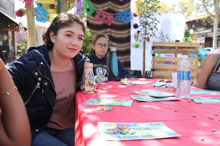 Anaheim High School students play loteria during Orange County's (Park)ing Day. Photo by Kristopher Fortin