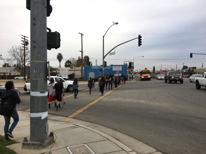 Students cross Ferguson Avenue along busy Chester Avenue in Bakersfield. Photo courtesy California Walks.