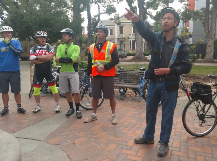 Zdenek Kekula, Santa Ana senior civil engineer, talks to bike group about bicycle and pedestrian infrastructure in the downtown.