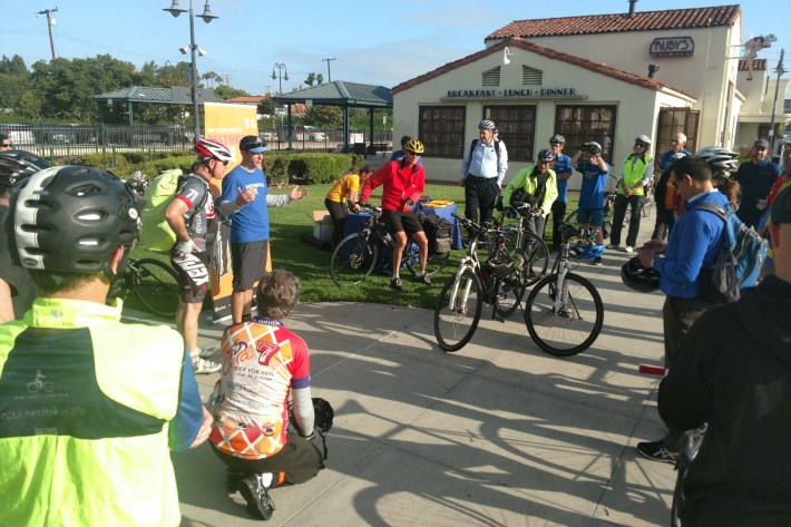 OCTA Active Transportation Coordinator Paul Martin welcomes bike rally participants at the Orange Station.