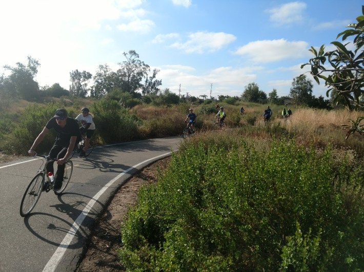 Bike Rally participants meander through through the Santiago Creek Bike Path.