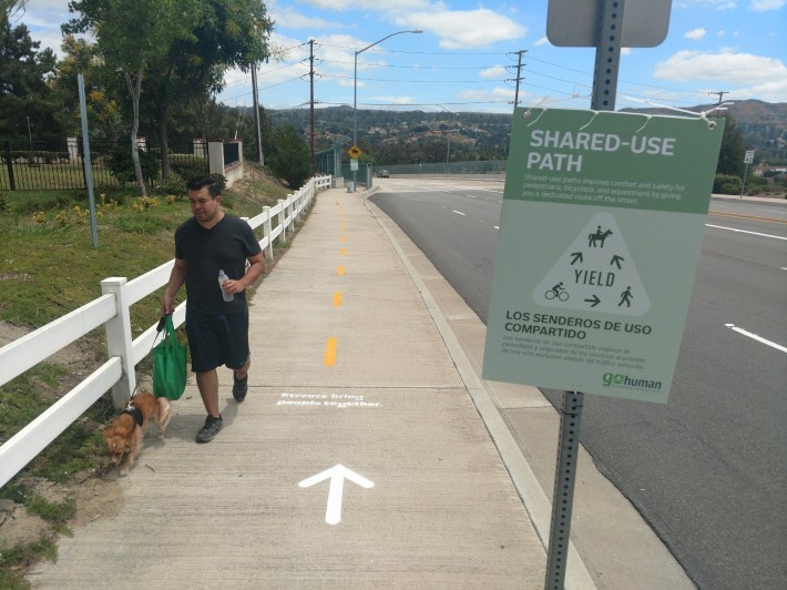Shared-use path on Fairmont Boulevard. The path was already separated from the main roadway, but was enhanced with signage and surface markings.