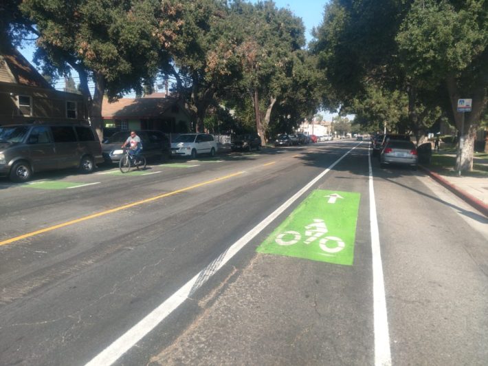 Bicyclists riding west on the Chestnut Avenue bike lane.