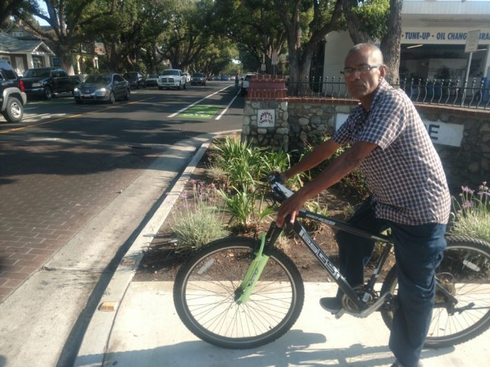 Emilio Rojas, 58, works at food truck at the corner of Walnut and Cypress. Rojas rides his bike 2 miles away and uses the newly added bike lanes to get to work.