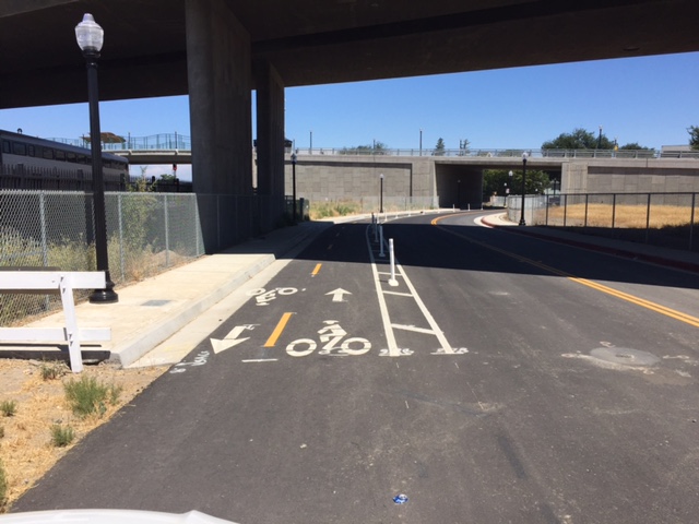 The two-way cycle track deadends under the 5th Street overpass--for now. Photo by Darren Conly