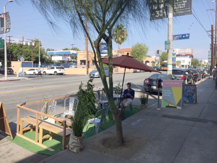 A parking space on Third in LA's Midcity became a quiet place to enjoy the day. Photo: Joe Linton/Streetsblog