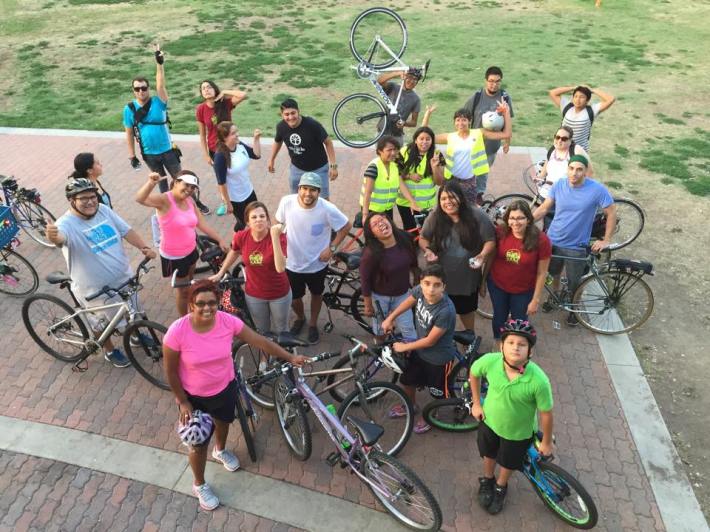 At a stop during one of SAAS's SAASy Thursdays family-friendly bike rides. Image: Santa Ana Active Streets