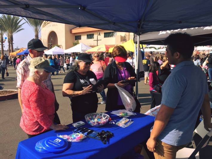 OCTA staff gather feedback for the OC Active plan at the La Habra's November tamale festival. As of early November, the team had participated in more than 40 community events throughout the county. Image: OC Active Facebook Page