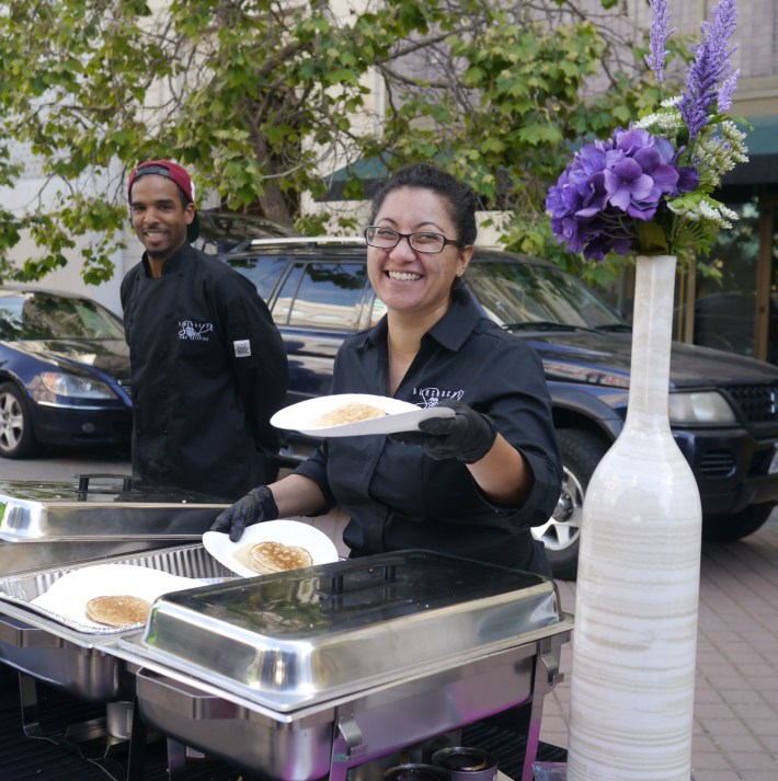 In downtown Oakland, an elegant pancake breakfast was served in Frank Ogawa Plaza. Complete with Flowers. Photo: Ginger Jui/Bike East Bay