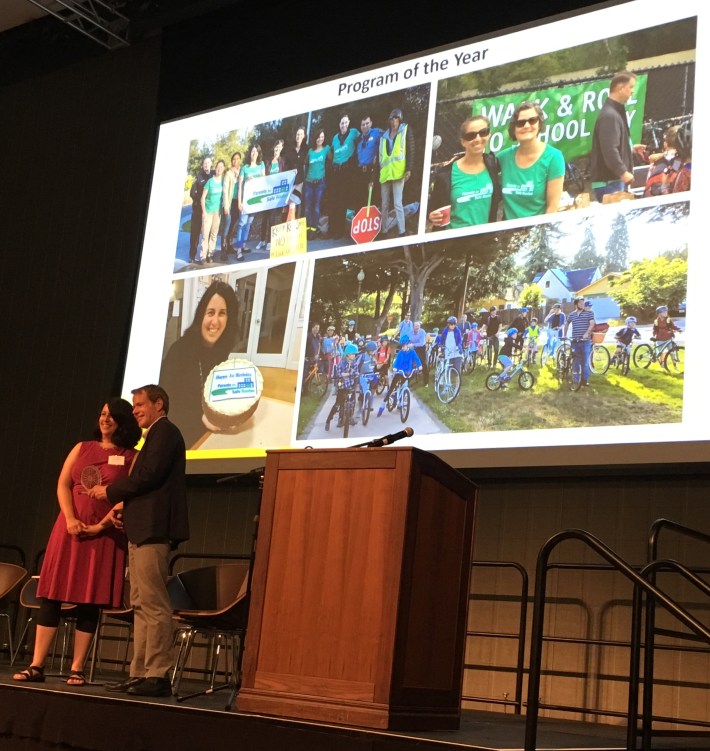 Santa Clara County Supervisor Ken Yeager awards Parents for Safe Schools in Menlo Park as Program of the Year for their work on bike education and safety advocacy.
