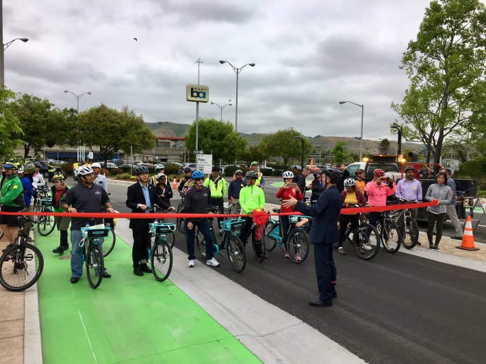 A new raised cycletrack--first in the East Bay--was officially opened in Fremont. Photo by Robert Prinz