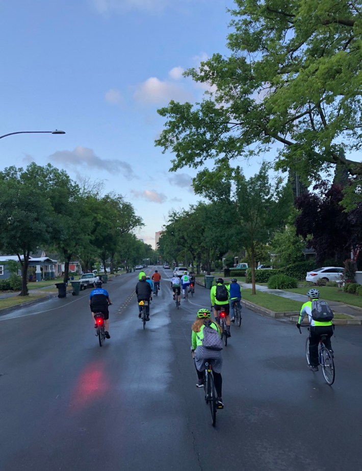 The Mayor's Bike to Work Day ride on a quiet street. Photo by Michael Sacuskie