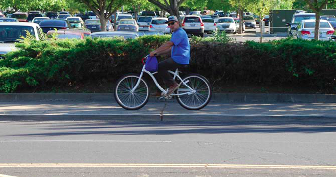 ATP projects are aimed at making bike riders like this feel safe enough to not ride on the sidewalk. Image: Sacramento Broadway Complete Streets Plan