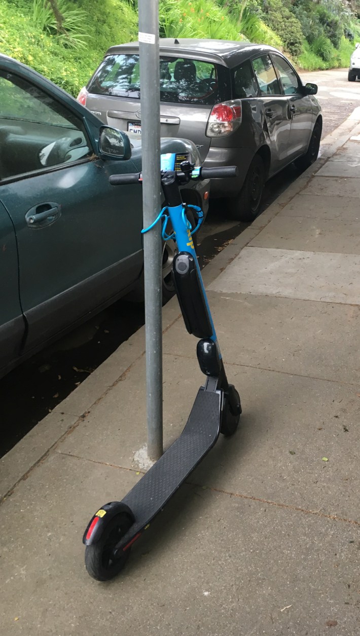 San Francisco has proven that requiring bikes and scooters to have locking mechanisms significantly reduces sidewalk clutter and related complaints.