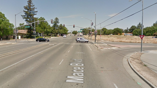Mace Blvd at Cowell, before the redesign. Slip lanes allowed cars to make fast right turns. Image: Google Street View, 2016