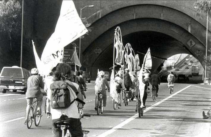 Riders approach the tunnel under Yerba Buena Island on the Oakland Bay Bridge. Photo by Thor Swift, circa 1998