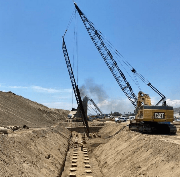 Crane works a wide ditch