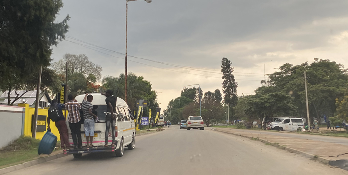 Combis in Harare, Zimbabwe, are not deterred from picking up passengers by full seats. Photo by Melanie Curry/Streetsblog