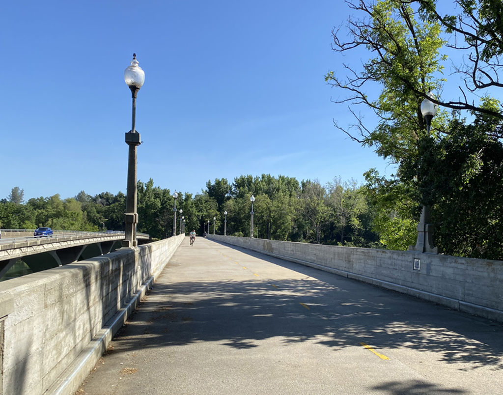 A historic bridge over the Sacramento River, too narrow for modern cars, was replaced with the bridge on the left. But this beauty is still there for bike riders and people on foot to use. Photo: Melanie Curry/Streetsblog
